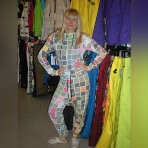 Volcom Checkered one piece suited for snowboarding